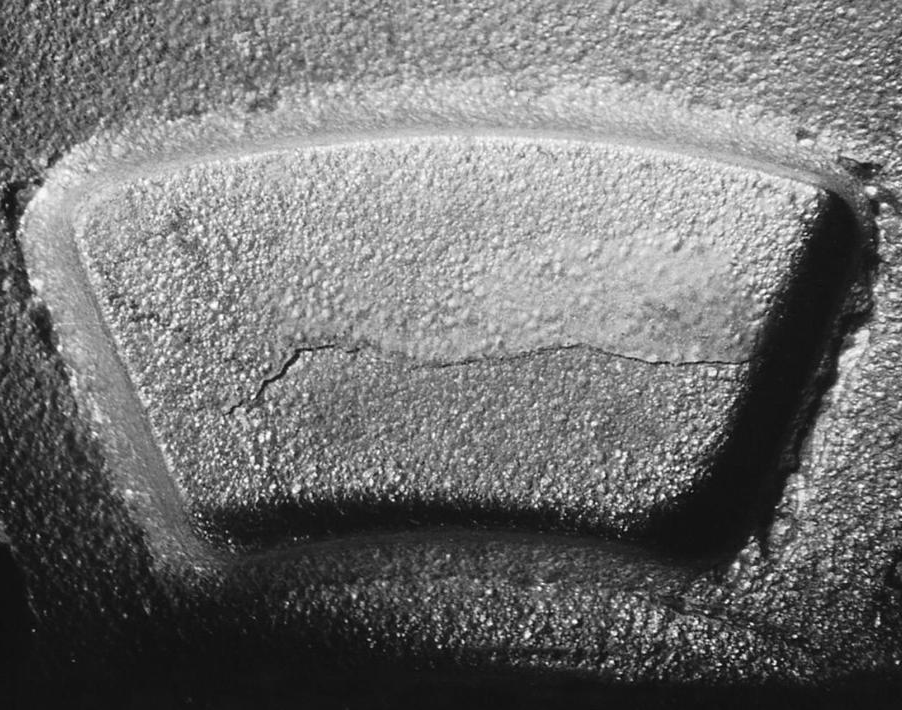 Laminations from uneven or slow flow, causing splashes with time to solidify as a layer before final fill.